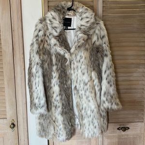 White spotted faux fur coat